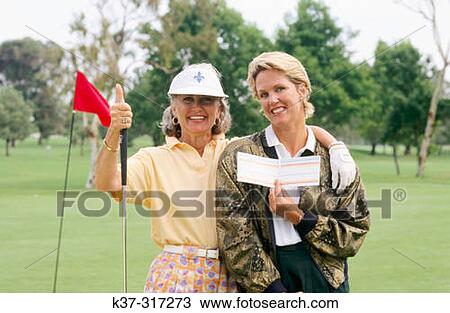 Golfing women showing their score cards View Large Photo Image Stock Image - Golfing women showing their score cards. Fotosearch
