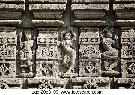 Gondeshwar Temple, carved pillars. Sinnar, Maharashtra, India. It is built on a vast area and consists of numerous shrines built in an architectural style called Hemadpanthi style. Black stone and lime temple. View Large Photo Image Stock Photo - Gondeshwar Temple, carved pillars. Sinnar, Maharashtra, India. It is built on a vast area and consists of numerous shrines built in an architectural style called Hemadpanthi style. Black stone and lime temple.. Fotosearch