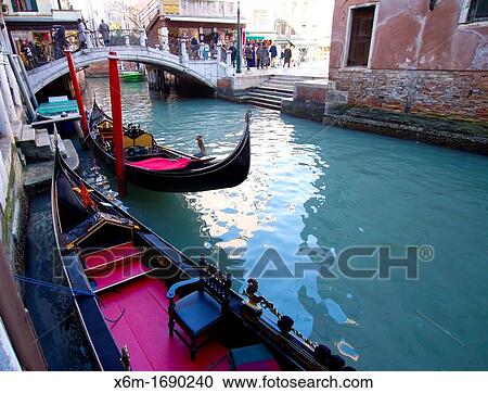 Stock Image - Gondola and canal Venice, Italy. Fotosearch