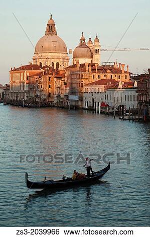 Gondola in front of Our Lady of the Salute Church at sunset, Venice, Veneto, Italy, Europe. View Large Photo Image Stock Photograph - Gondola in front of Our Lady of the Salute Church at sunset, Venice, Veneto, Italy, Europe.. Fotosearch