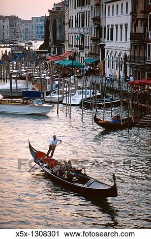 Gondola on the Grand Canal at sunset in Venice, Italy View Large Photo Image Stock Image - Gondola on the Grand Canal at sunset in Venice, Italy. Fotosearch
