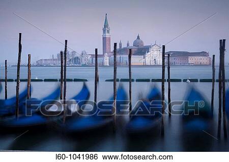 Stock Photograph - Gondolas and San Giorgio Maggiore in background Venice Italy. Fotosearch