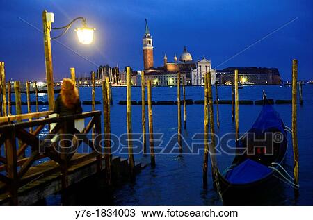 Gondolas and San Giorgio Maggiore church in background at dusk in Venice, Italy, Europe View Large Photo Image Stock Image - Gondolas and San Giorgio Maggiore church in background at dusk in Venice, Italy, Europe. Fotosearch