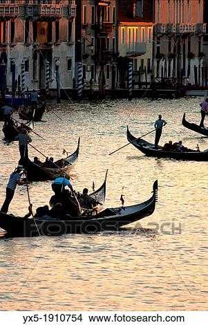 Picture - Gondolas carrying tourists on Grand Canal in Venice. Fotosearch