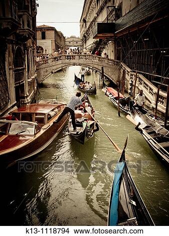 Gondolas in a canal, Venice, Italy View Large Photo Image Picture - Gondolas in a canal, Venice, Italy. Fotosearch