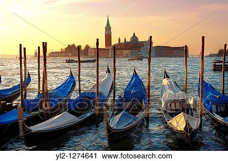 Gondolas in the early morning sun - Vnice Italy View Large Photo Image Stock Image - Gondolas in the early morning sun - Vnice Italy. Fotosearch