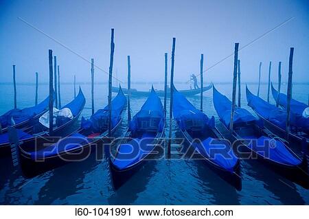 Gondolas in the fog from Piazza San Marco, with San Giorgio Maggiore in the background, Venice, Venezia, Italy View Large Photo Image Stock Image - Gondolas in the fog from Piazza San Marco, with San Giorgio Maggiore in the background, Venice, Venezia, Italy. Fotosearch