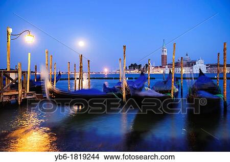 Gondolas moored at the St Marks Basin waterfront, Venice, Italy View Large Photo Image Picture - Gondolas moored at the St Marks Basin waterfront, Venice, Italy. Fotosearch
