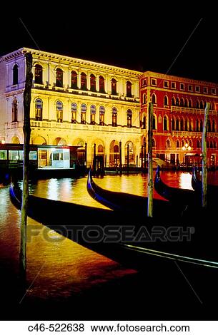 Gondolas on Grand Canal, the palazzo Dolfin Manin on the left and Palazzo Bembo on the right Venice. Veneto, Italy View Large Photo Image Stock Photo - Gondolas on Grand Canal, the palazzo Dolfin Manin on the left and Palazzo Bembo on the right Venice. Veneto, Italy. Fotosearch