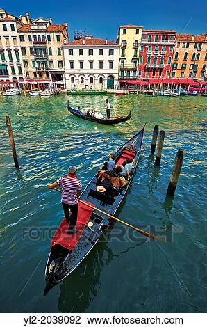 Stock Image - Gondolas on the Grand Canal near Rialto, Venice, Italy.. Fotosearch