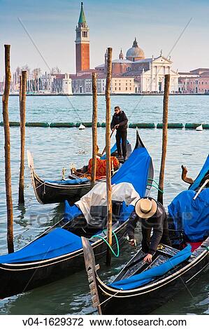 Gondolas on the lagoon in front of San Girogio Maggiore, Venice, Italy, Europe View Large Photo Image Stock Image - Gondolas on the lagoon in front of San Girogio Maggiore, Venice, Italy, Europe. Fotosearch