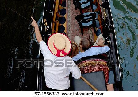 Stock Image - Gondolas on the narrow canals of Venice, Italy. Fotosearch