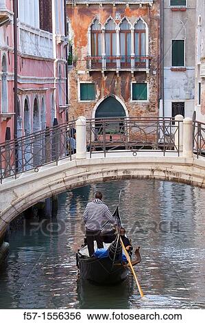 Gondolas on the narrow canals of Venice, Italy View Large Photo Image Stock Photograph - Gondolas on the narrow canals of Venice, Italy. Fotosearch