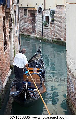 Gondolas on the narrow canals of Venice, Italy View Large Photo Image Stock Photography - Gondolas on the narrow canals of Venice, Italy. Fotosearch