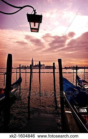 Stock Photograph - Gondole and Island of San Giorgio Maggiore viewed from Venice, Italy. Fotosearch