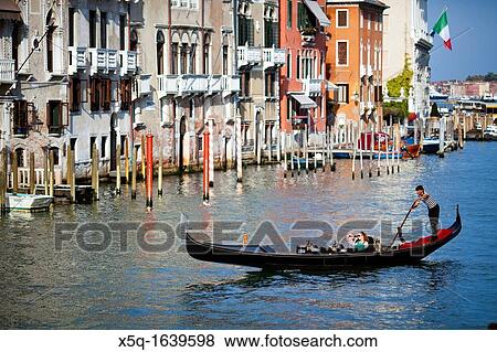 Gondolier at work, Grand Canal, Venice, Italy View Large Photo Image Stock Photo - Gondolier at work, Grand Canal, Venice, Italy. Fotosearch