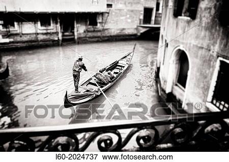 Gondolier in Venice, Italy. View Large Photo Image Stock Photo - Gondolier in Venice, Italy.. Fotosearch