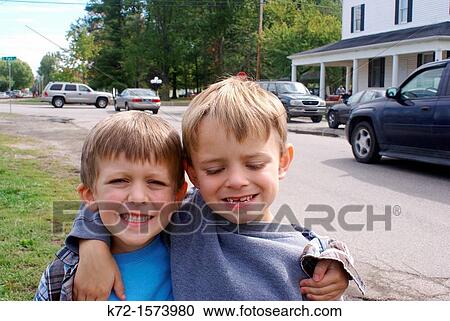 Good friends arms around each other smiling for camera View Large Photo Image Stock Image - Good friends arms around each other smiling for camera. Fotosearch