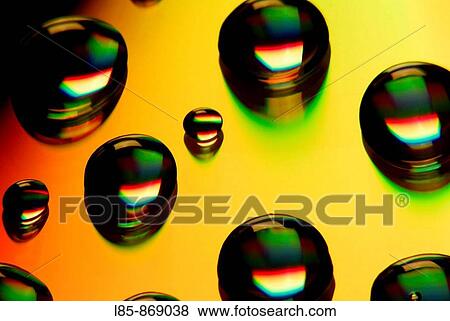 Stock Photo - Gotas de agua sobre superficie metalica. Fotosearch
