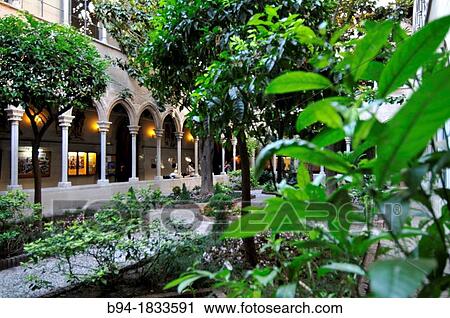 Stock Image - Gothic cloister. Inmaculada Concepci? n y Asunci? n de Nuestra Seora parish. XV-XVI century AD. 70, Roger de Lluria street. Barcelona. Catalonia. Spain. Fotosearch