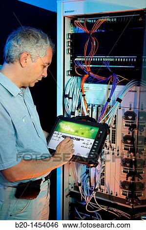 Gpondoctor FTTH (Fiber-to-the-home) analysis & monitoring tools, optical fiber network analyzer to identify anomalies in the communications between operator and customers homes, Electronics Lab, Tecnalia Research & Innovation View Large Photo Image Stock Photograph - Gpondoctor FTTH (Fiber-to-the-home) analysis & monitoring tools, optical fiber network analyzer to identify anomalies in the communications between operator and customers homes, Electronics Lab, Tecnalia Research & Innovation. Fotosearch