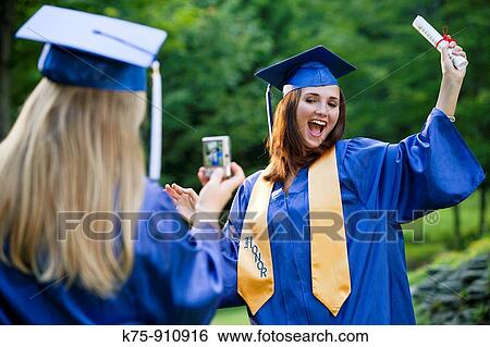 Graduate poses for photo View Large Photo Image Stock Photograph - Graduate poses for photo. Fotosearch