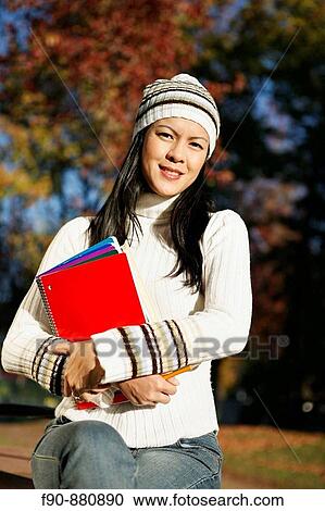 Graduate student w autumn leaves MR View Large Photo Image Stock Image - Graduate student w autumn leaves MR. Fotosearch