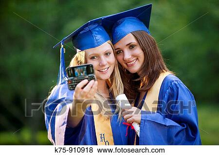 Graduates pose for photo View Large Photo Image Stock Photo - Graduates pose for photo. Fotosearch