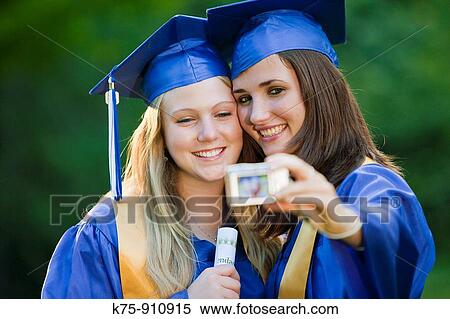 Graduates pose for photo View Large Photo Image Stock Photography - Graduates pose for photo. Fotosearch