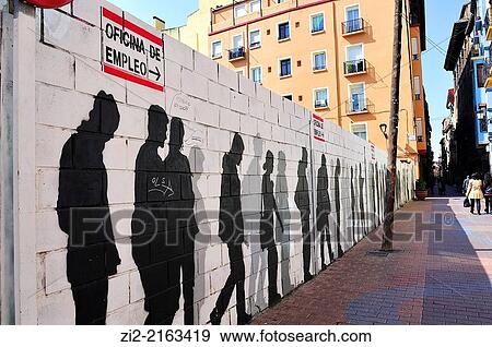 Stock Photo - Graffiti depicting a line of unemployed, Saint Paul's Quarter, Zaragoza, Spain. Fotosearch