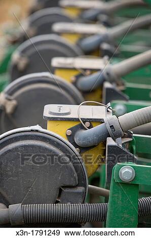 Stock Photo - Grain harvesting equipment. Fotosearch
