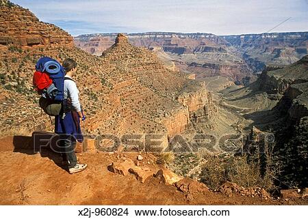 Grand Canyon National Park - Martha Gruelle backpacking near the top of the Bright Angel Trail in the Grand Canyon MR View Large Photo Image Picture - Grand Canyon National Park - Martha Gruelle backpacking near the top of the Bright Angel Trail in the Grand Canyon MR. Fotosearch