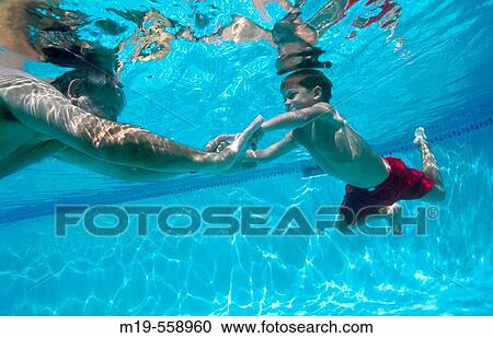 grandfather and grandson underwater View Large Photo Image Stock Image - grandfather and grandson underwater. Fotosearch