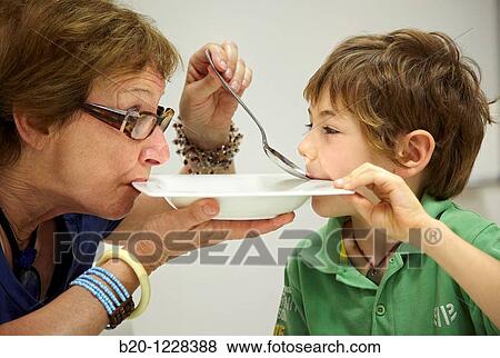 Grandma and grandson eating from the same dish, tasting session in sensory analysis lab, AZTI-Tecnalia Marine and Food Research Center, Derio, Bizkaia, Euskadi, Spain View Large Photo Image Stock Photo - Grandma and grandson eating from the same dish, tasting session in sensory analysis lab, AZTI-Tecnalia Marine and Food Research Center, Derio, Bizkaia, Euskadi, Spain. Fotosearch