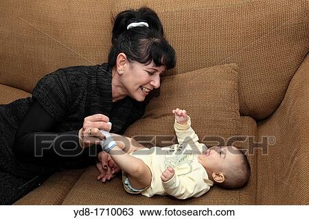 Grandma with baby View Large Photo Image Stock Image - Grandma with baby. Fotosearch