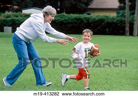 grandmother playing with grandson View Large Photo Image Stock Image - grandmother playing with grandson. Fotosearch