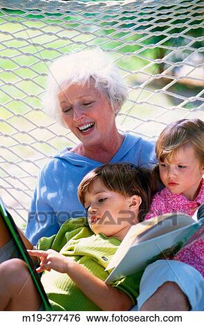 grandmother with 2 grandchildren View Large Photo Image Stock Photograph - grandmother with 2 grandchildren. Fotosearch