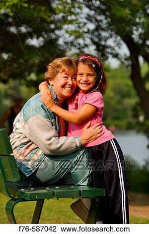 Grandmother with her granddaughter. View Large Photo Image Stock Image - Grandmother with her granddaughter.. Fotosearch