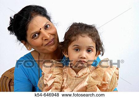 Stock Photo - Grandmother with her granddaughter.. Fotosearch