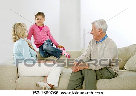 Grandparents and granddaughter View Large Photo Image Stock Photograph - Grandparents and granddaughter. Fotosearch
