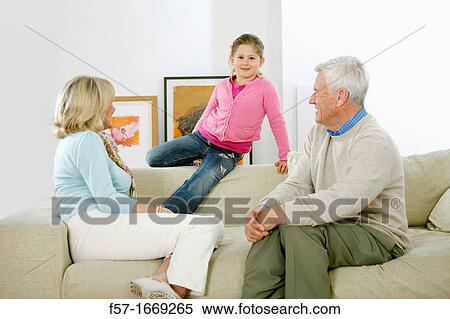Grandparents and granddaughter View Large Photo Image Stock Photography - Grandparents and granddaughter. Fotosearch