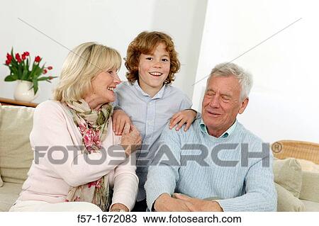 Stock Image - Grandparents and grandson. Fotosearch