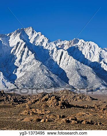 Granite rock formations of Alabama Hills with Lone Pine peak and Sierra Nevada mountains in background, California View Large Photo Image Stock Photography - Granite rock formations of Alabama Hills with Lone Pine peak and Sierra Nevada mountains in background, California. Fotosearch