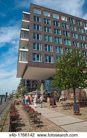 Stock Image - Grasbrookhafen canalside Warehouse district HafenCity former harbour area central Hamburg Germany Europe. Fotosearch