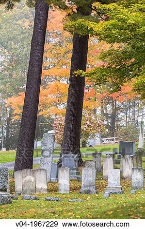 Stock Photo - Graves in the historic cemetry in Peacham, Vermont, USA. Fotosearch