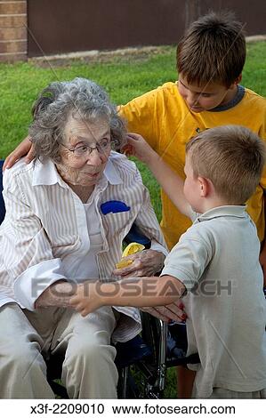 Great grandma enjoying a happy moment with her great grandsons age 8 and 5. Battle Lake Minnesota MN USA. View Large Photo Image Stock Image - Great grandma enjoying a happy moment with her great grandsons age 8 and 5. Battle Lake Minnesota MN USA.. Fotosearch
