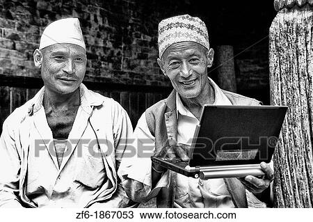 Great image of modern technology with local Hindu men and new laptop computer in village of Bhaktapur a town near Kathmandu Nepal View Large Photo Image Stock Image - Great image of modern technology with local Hindu men and new laptop computer in village of Bhaktapur a town near Kathmandu Nepal. Fotosearch