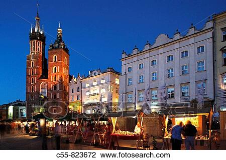 Great Market Square or Main Square, Basilica of the Virgin Mary, 14th century, Gothic Cathedral, Cracow, Krakow, Poland View Large Photo Image Stock Image - Great Market Square or Main Square, Basilica of the Virgin Mary, 14th century, Gothic Cathedral, Cracow, Krakow, Poland. Fotosearch