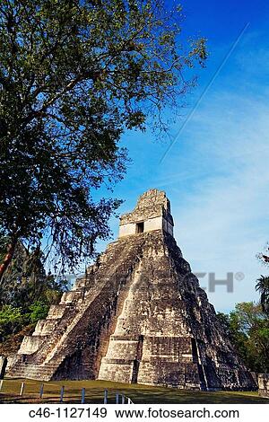 Great Plaza and Temple of the Giant Jaguar. Temple I. Mayan ruins of Tikal. Guatemala. View Large Photo Image Stock Photo - Great Plaza and Temple of the Giant Jaguar. Temple I. Mayan ruins of Tikal. Guatemala.. Fotosearch