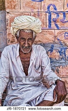 Stock Image - Great portrait of older Hindu man with turban in Jodhpur Rajasthan India. Fotosearch